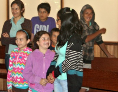 Young and old laugh together at Monteverde Friends School